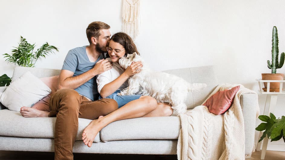 couple embracing on the couch