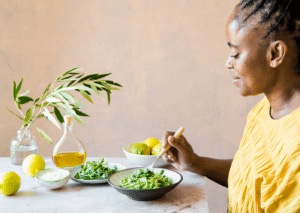 Woman Eating Pasta Meal, Healthy Meal With Lots Of Greens